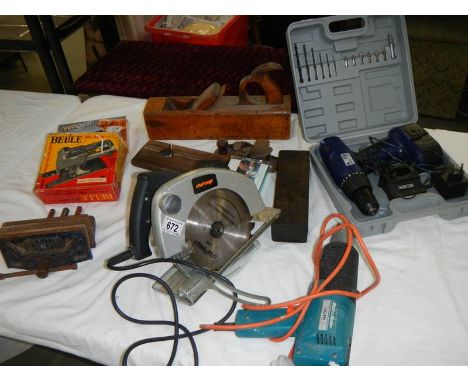 A mixed lot of old and modern tools.