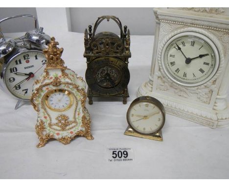 A small lot of assorted mantel clocks including brass lantern clock (bell present but not fitted).