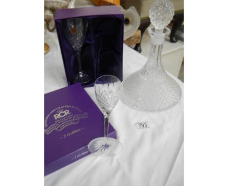 A good quality sherry decanter and 2 lead crystal goblets.