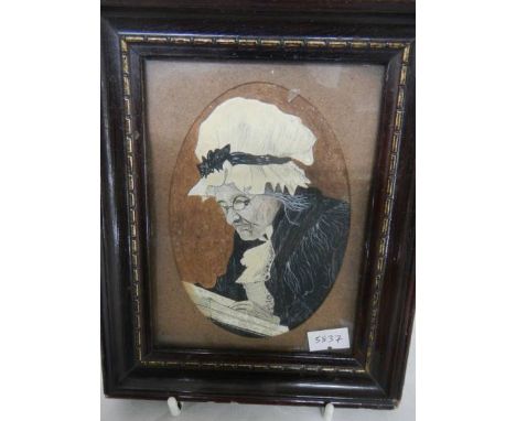 A framed watercolour portrait of an elderly lady, signed W Hill.