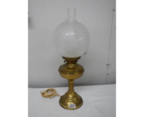 A brass half Nelson style electric table lamp complete with shade but needs plug.