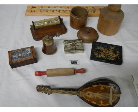 A mixed lot including match holder, perpetual calendar, thermometer, etc.,