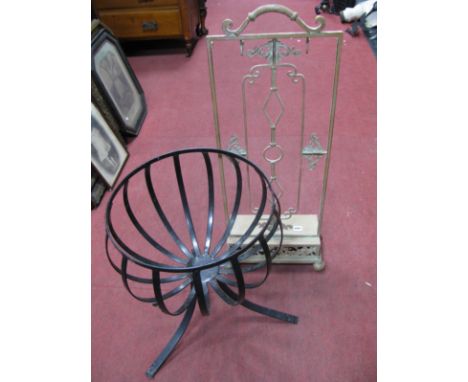 A Cast Jardiniere Planter, on splayed legs; together within painted cast iron stand.