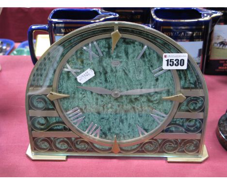 A Smith Sectric 1950's Mantel Clock, with gilt metal surround, scrollwork and silvered Roman numerals against a green velvet 