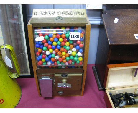 A 'Baby Grand' (Victor Wood) Gumball Vending Machine, circa mid XX Century, in light oak with chrome and bronzed fittings, 32