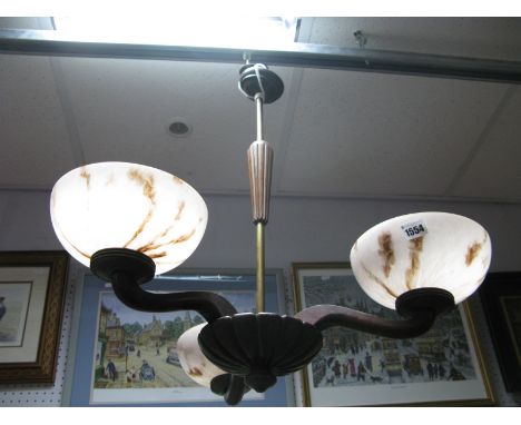 A Mid XX Century Three Branch Ceiling Light, scroll wooden branches and lobed boss, fitted with three mottled pink glass 'she