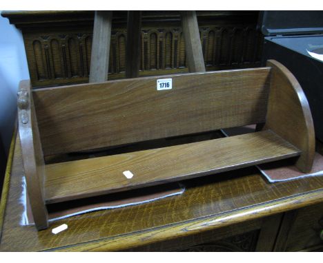 An Oak Book Trough by Colin Almack, of oblong form with quadrant ends, carved beaver trademark in high relief; together with 