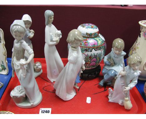 A Lladro Model of a Sweeping Child, four Nao figures, a similar Valencia figurine and a Famille Rose ginger jar and cover on 