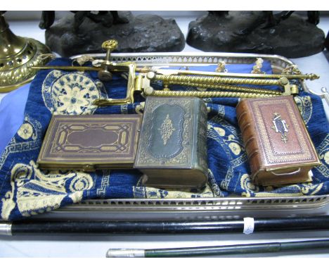 A Machine Tapestry Screen, suspended on folding gilt metal supports and clamp, and three Victorian tooled leather prayer/hymn