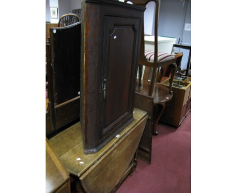 A XIX Century Flat Fronted Oak Corner Wall Cupboard, having two shaped inner shelves; a joined oak oval topped drop leaf dini