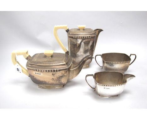 A Hallmarked Silver Four Piece Tea Set, CB&amp;S, Sheffield 1941, of Art Deco style with ivorine handles (overall weight 1770