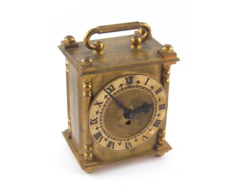 A 20th century Smiths brass "carriage clock" with front wind mechanical movement, height approx 12cm.
