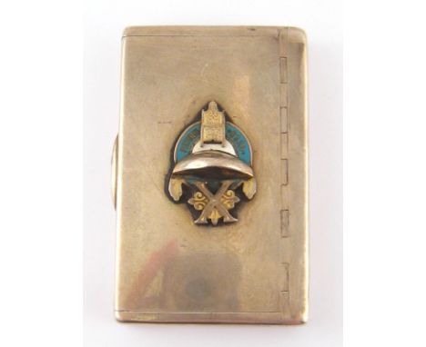 A Russian silver cigarette box, the plain surface with box hinge and applied pan-Slavic enamel decoration. St. Petersburg c.1