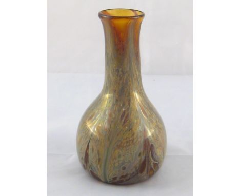 A studio glass vase , the light brown body with streaked grey and green metal drawn up towards the tall neck. Ht.14cm. 