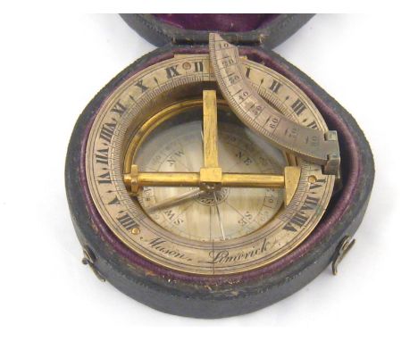 An early 19th. century compass with latitude setting sundial attachment, the brass body with silvered compass card and scales