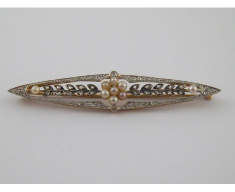 An antique 15 carat gold, platinum, diamond and untested pearl brooch, approx 6.5cm long, pearls approx 2.5mm diameter, 7.4 g