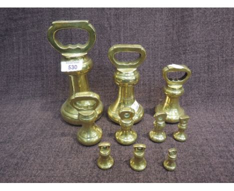 A selection of vintage brass butchers weights including named for Herbert & Sons, West SmithfieldLargest weight is 7lb.1,2,3 
