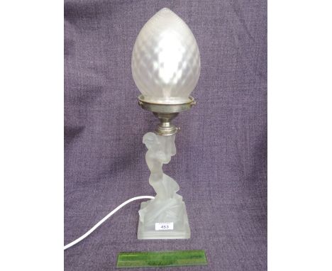 A French 1930's Art Deco style opaque glass lamp modelled as a diaphanous cherub maiden