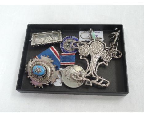 A small selection of white metal and HM silver jewellery including medallions, ring and brooches including enamelled St James