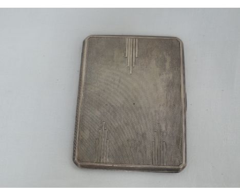 A 1930's silver cigarette case having moulded and engine turned decoration, Birmingham 1935, Mappin & Webb Ltd,  approx 169g