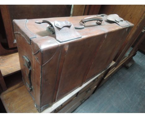 An early 20th century vintage American leather suitcase stamped U.S.A.