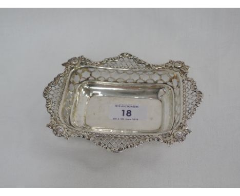 A Victorian silver trinket dish of shaped rectangular form having pierced decoration and moulded rim, Sheffield 1898, Goldsmi