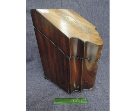 An early 19th century George III mahogany knife box having slope top with shell inlay decoration, with fitted slat interior a