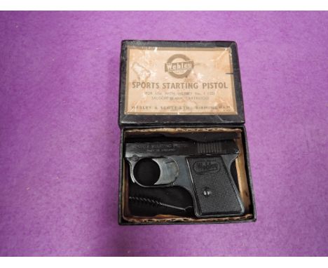 A vintage Webley .22 blank fire sports starting pistol, in original box 