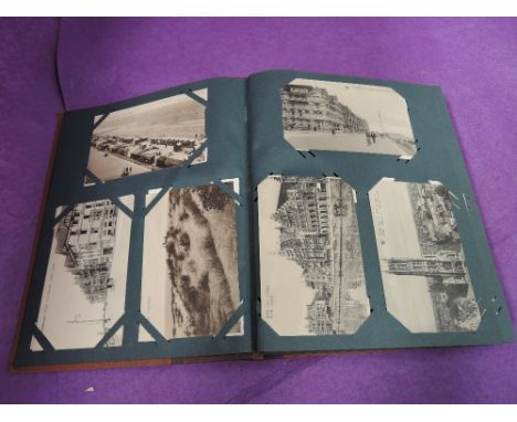 A vintage postcard album of mainly foreign postcards