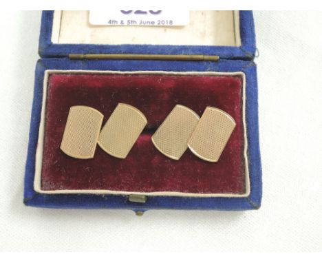 A pair of 9ct gold cufflinks having engine turned decoration and chain connectors, approx 3.3g