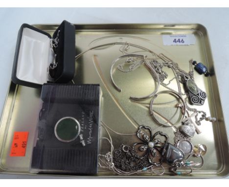 A small selection of white metal jewellery including enamelled pendant, twist bangle, christening bangle, cufflinks etc