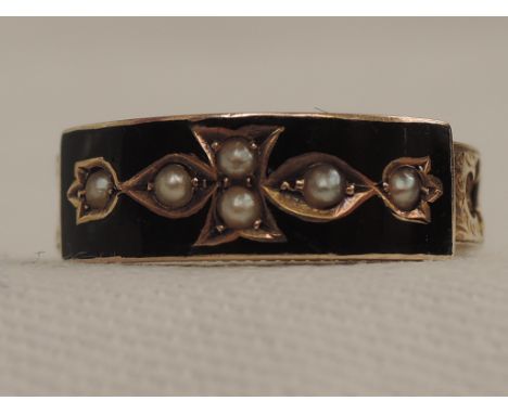 A Victorian 9ct gold mourning ring having plaited hair panels and black enamel and seed pearl decoration,  Chester 1891,  siz
