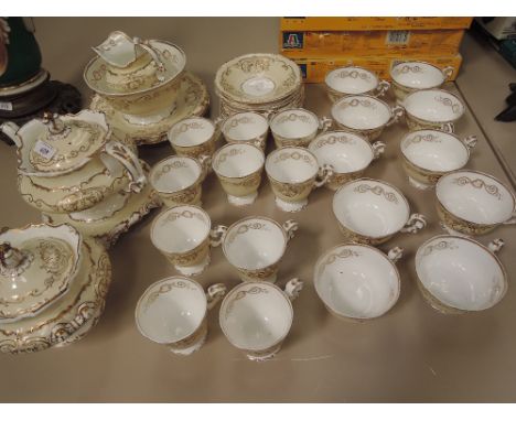 An early 19th century Copeland and Garrett tea service comprising teapot/stand, milk, sugar, slop, two serving plates and sau