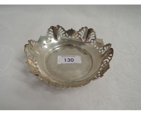 A small silver trinket dish having shaped pierced decoration to rim, Sheffield 1935, Viners