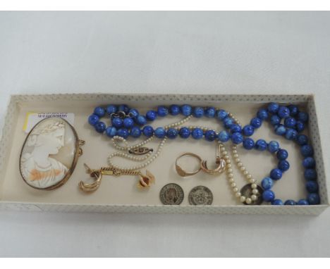 A small selection of jewellery including a string of seed pearls with yellow metal clasp stamped 9ct, pair of 9ct gold earrin