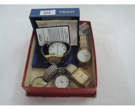 A selection of gents wrist watches including a 1970's Tissot PR516 gold plated watch having baton dial and date aperture with