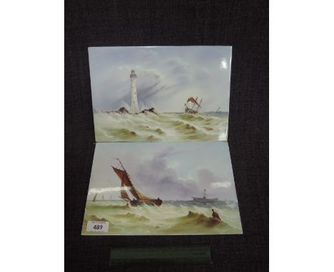 A pair of 19th century porcelain plaques having painted seascape decoration