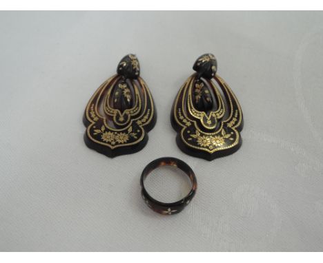 A pair of Victorian style tortoise shell drop earrings having double loop and central panel all having yellow metal picque wo