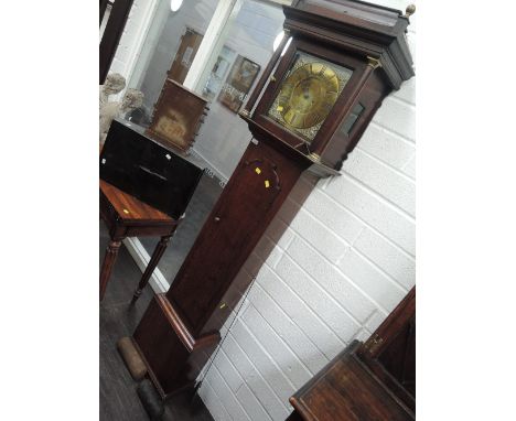 A late 18th century oak longcase clock having square stepped and pillar hood containing square brass face and 8 day movement 