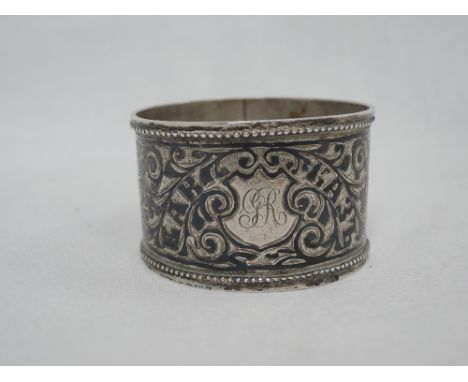 A Russian silver napkin ring having niello decoration and monogram to cartouche, Russian hallmarks 1896-1908