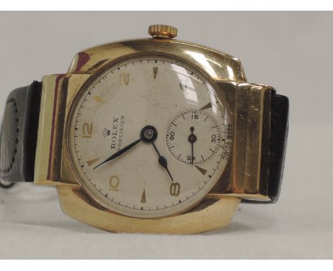 A gent's 9ct gold vintage Rolex precision wrist watch having Arabic numeral dial with subsidiary seconds to circular face in 