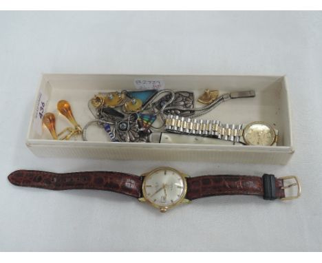 A small selection of costume jewellery including earrings, gents Tosal wrist watch and lady's Tissot wrist watch