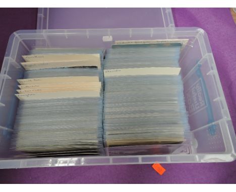 A plastic box containing approximately 550 vintage postcards of mainly Cumbria