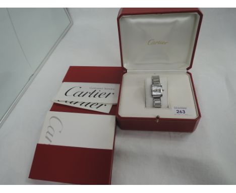 A lady's Cartier stainless steel 2384 tank watch (no: 792443CD) having Roman numeral dial to square face on steel bracelet st