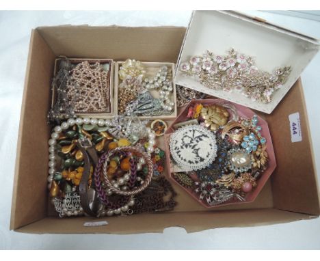 A selection of vintage costume jewellery including brooches, beaded collarette, watches etc