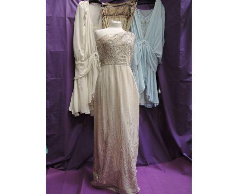 Four lady's vintage evening dresses including Belville Sasoon one shoulder cream dress with glitter cluster decoration, Janic