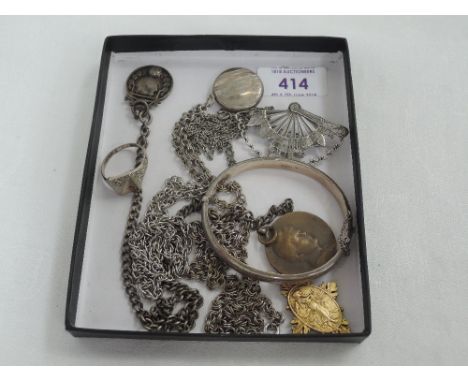 A selection of white metal and HM silver jewellery including hinged bangle, signet ring, brooch, locket, Morecambe Music Fest