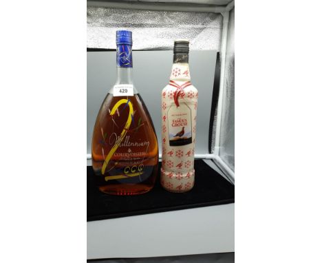 Lot 420 Bottle Courvoisier Cognac and bottle Famous Grouse whisky . 