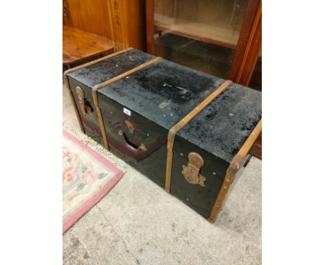 Antique travel trunk . 