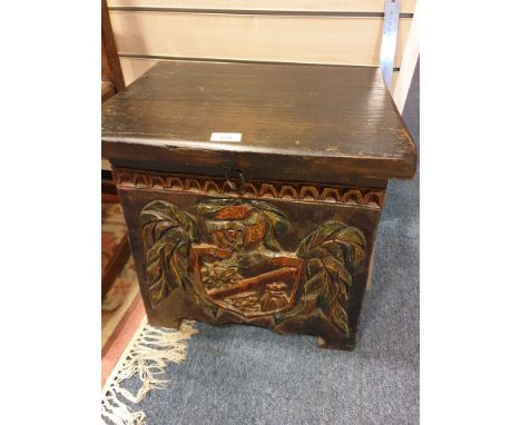 Beautiful example of a carved wooden trunk with shield foliage and carved designs . 